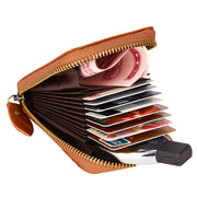 Open orange Mercer RFID card wallet with cards and folded cash