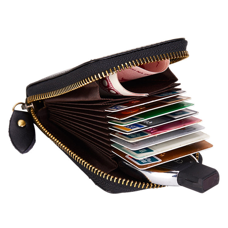 Black Mercer RFID zip-around leather card wallet open with cards and folded cash