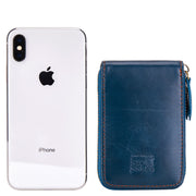 Blue Mercer leather card wallet shown beside a smartphone for scale