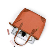 Orange | Madison orange zip tote shown open with everyday essentials