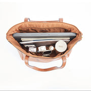 Beige | Madison beige zip tote shown open with everyday essentials