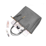 Gray | Madison gray zip tote shown open with everyday essentials