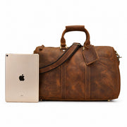 Light Brown | Beaumont 17-inch leather travel duffel shown beside tablet for size reference
