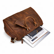 Light Brown | Beaumont leather weekender open view with laptop, books and travel essentials
