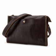 Harrison dark brown leather crossbody portfolio bag angled front view