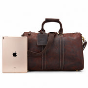 Dark Brown | Beaumont 17-inch dark brown leather weekender shown beside tablet for size reference