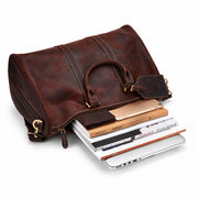 Dark Brown | Beaumont leather weekend bag open view with laptop, books and travel essentials