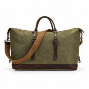 Green | Voyager green waxed canvas duffel rear view with leather trim