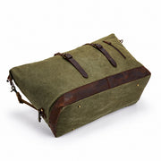 Green | Voyager green waxed canvas duffel reinforced bottom view