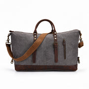 Gray | Voyager gray 50L waxed canvas travel duffel front view