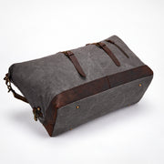Gray | Voyager gray waxed canvas duffel reinforced bottom view