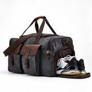Gray | Gray travel duffel with separate shoe compartment open