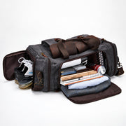 Gray | Gray duffel with packed main section and separate shoe storage