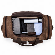Dark Brown | Dark brown weekender duffel open top view with packed clothing