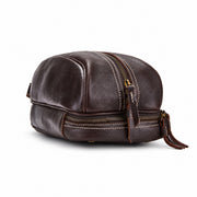 Sullivan double compartment leather dopp kit angled side view with carrying handle