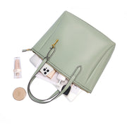 Celadon | Madison celadon zip tote shown open with everyday essentials