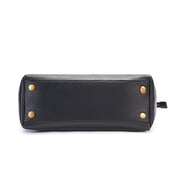 Black | Madison black tote bag reinforced bottom with metal feet
