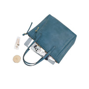 Dark Blue | Madison dark blue zip tote shown open with everyday essentials