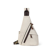 White | Atlas white convertible sling bag angled view with zippered pockets