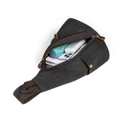 Gray | Atlas gray canvas sling backpack open with organized main compartment