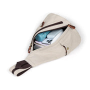 White | Atlas white canvas sling bag open with organized main compartment