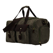 Green | Olive green weekender bag with leather trim and adjustable shoulder strap